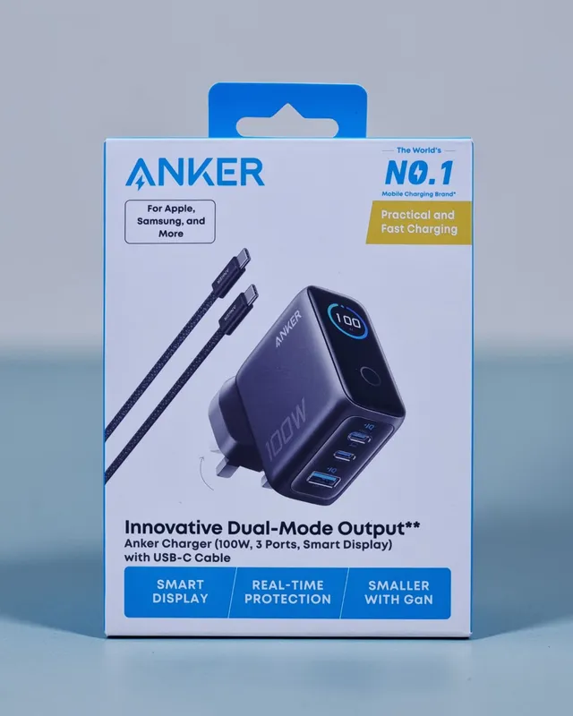 The Anker 100W 3-Port GaN Charger with Smart Display (Model B121B), a fast wall charger for phones, tablets, and laptops