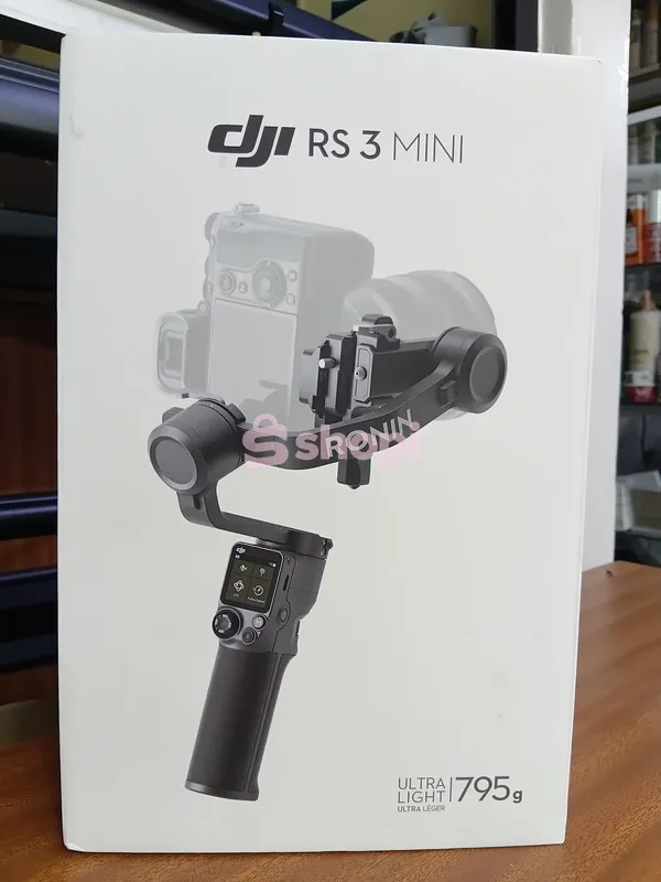 The DJI RS 3 Mini 3-axis handheld gimbal stabilizer.