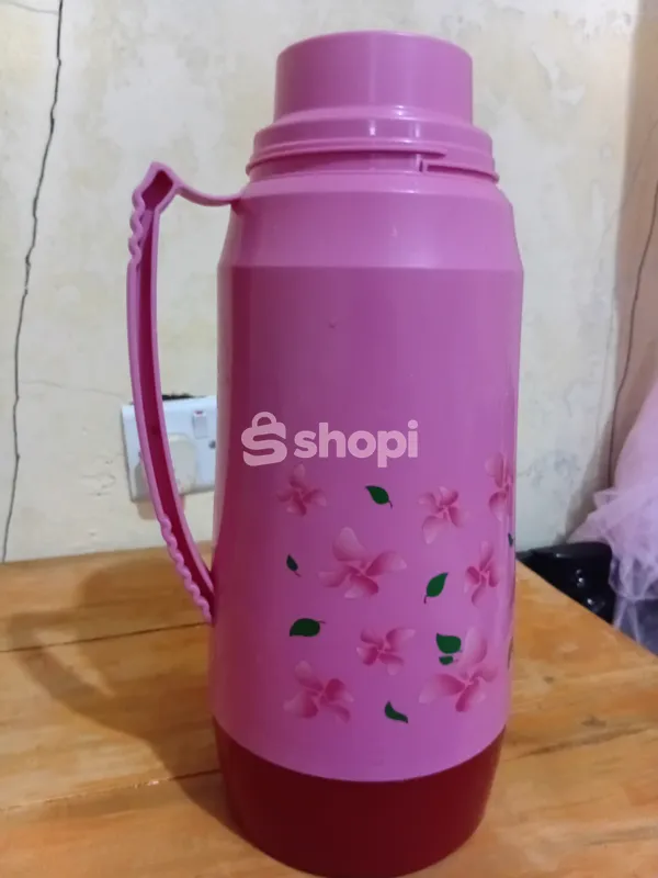 A pink 5 cup thermos
