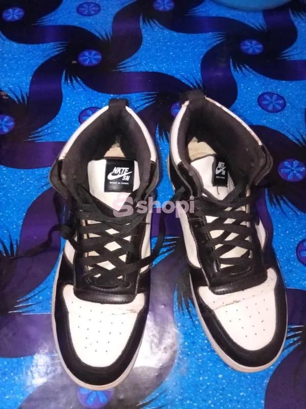 A black and white nike shoes