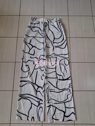 White Wide Leg Trousers with Navy Blue Abstract Pattern