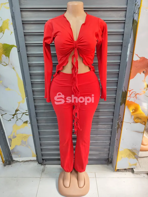 Red long sleeve crop top and flared pants set