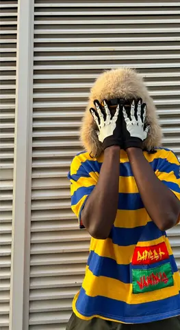 Blue and Yellow Striped T-Shirt with Furry Ushanka Hat